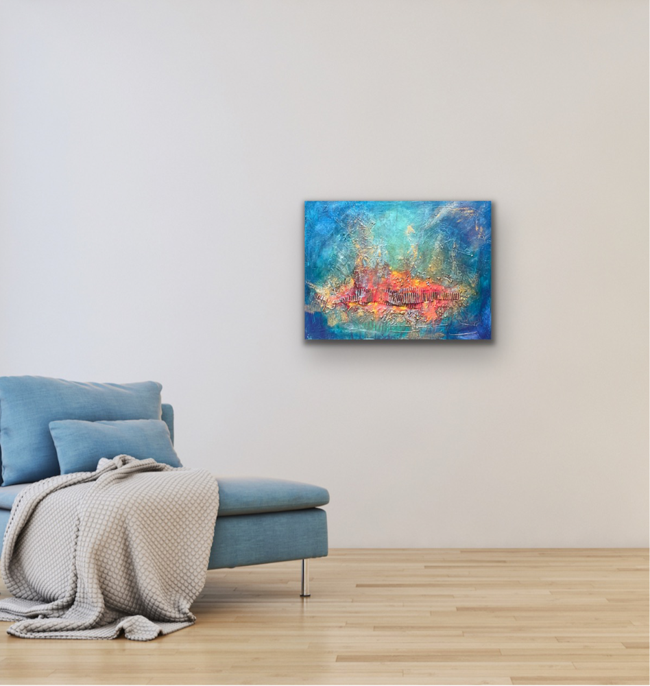 mixed media with a red / orange and gold textured focal point surrounded with a blue turquoise background.