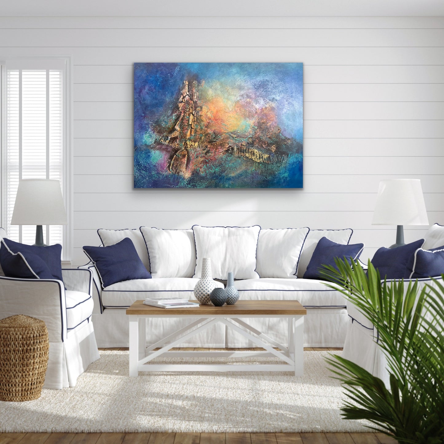 abstract textured artwork with blue backgound and warm colours of red and yellows and golds