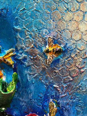 blue background, sunflowers and beehive raised above the canvas created with powrtex. powertex  clay bees placed at the top. lovely warm red, oranges and yellows 