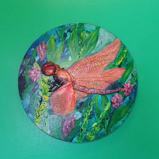 aferdita fazliu drozd art, orange dragonfly on green background of flowers and grasses. mixed media created with acrylic and crackle paste 