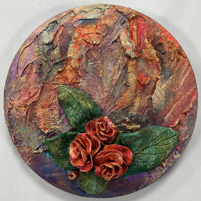 garnden of memories sculpted flowers on a round canvas artwork by Aferdita Fazliu Drozt, Bromley based mixed media artist and tutor