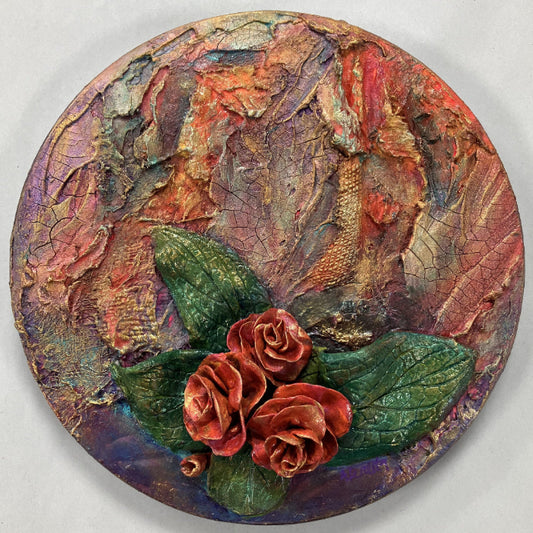 garnden of memories sculpted flowers on a round canvas artwork by Aferdita Fazliu Drozt, Bromley based mixed media artist and tutor