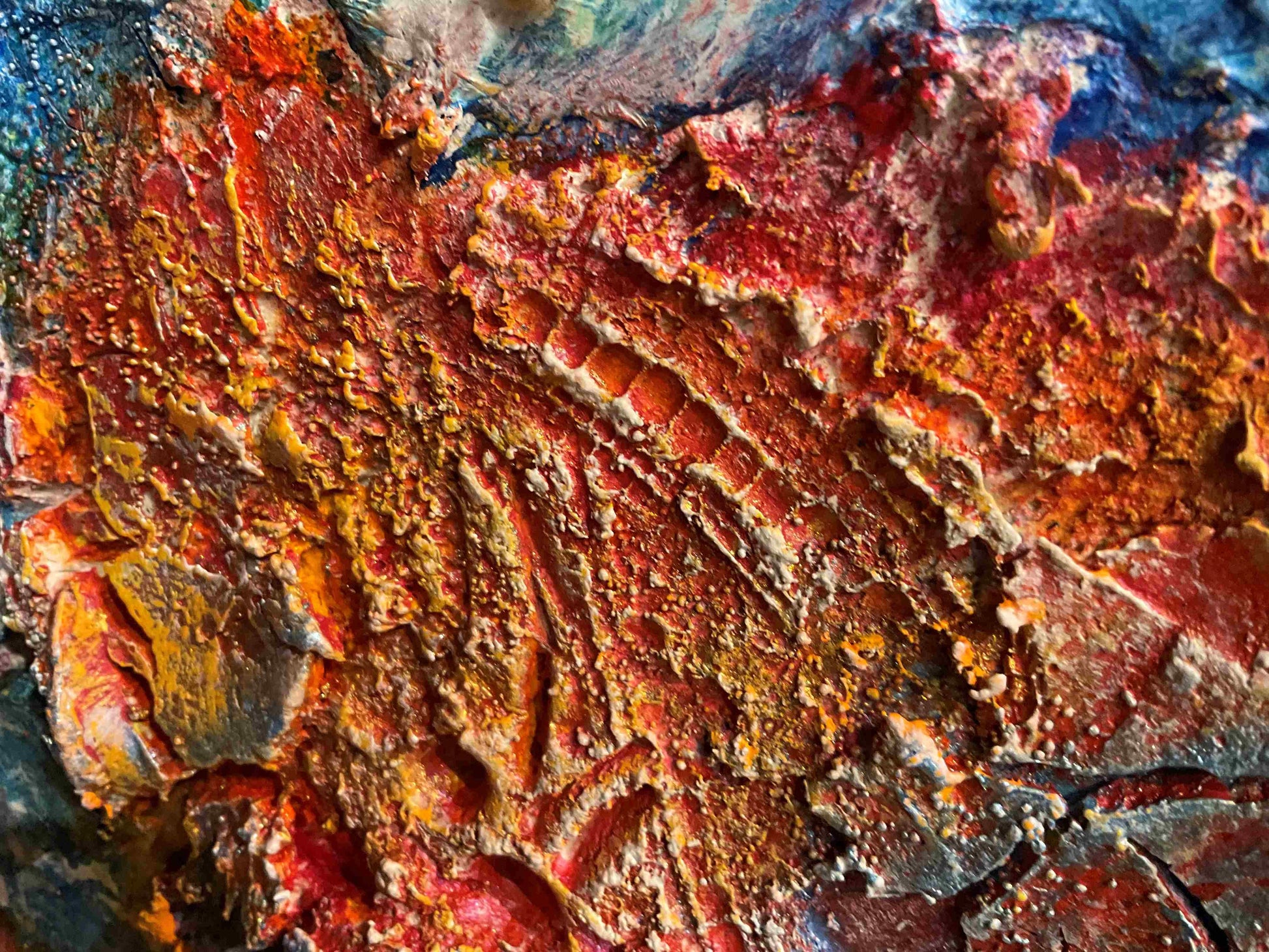 red and blue textured and tactile abstract painting 