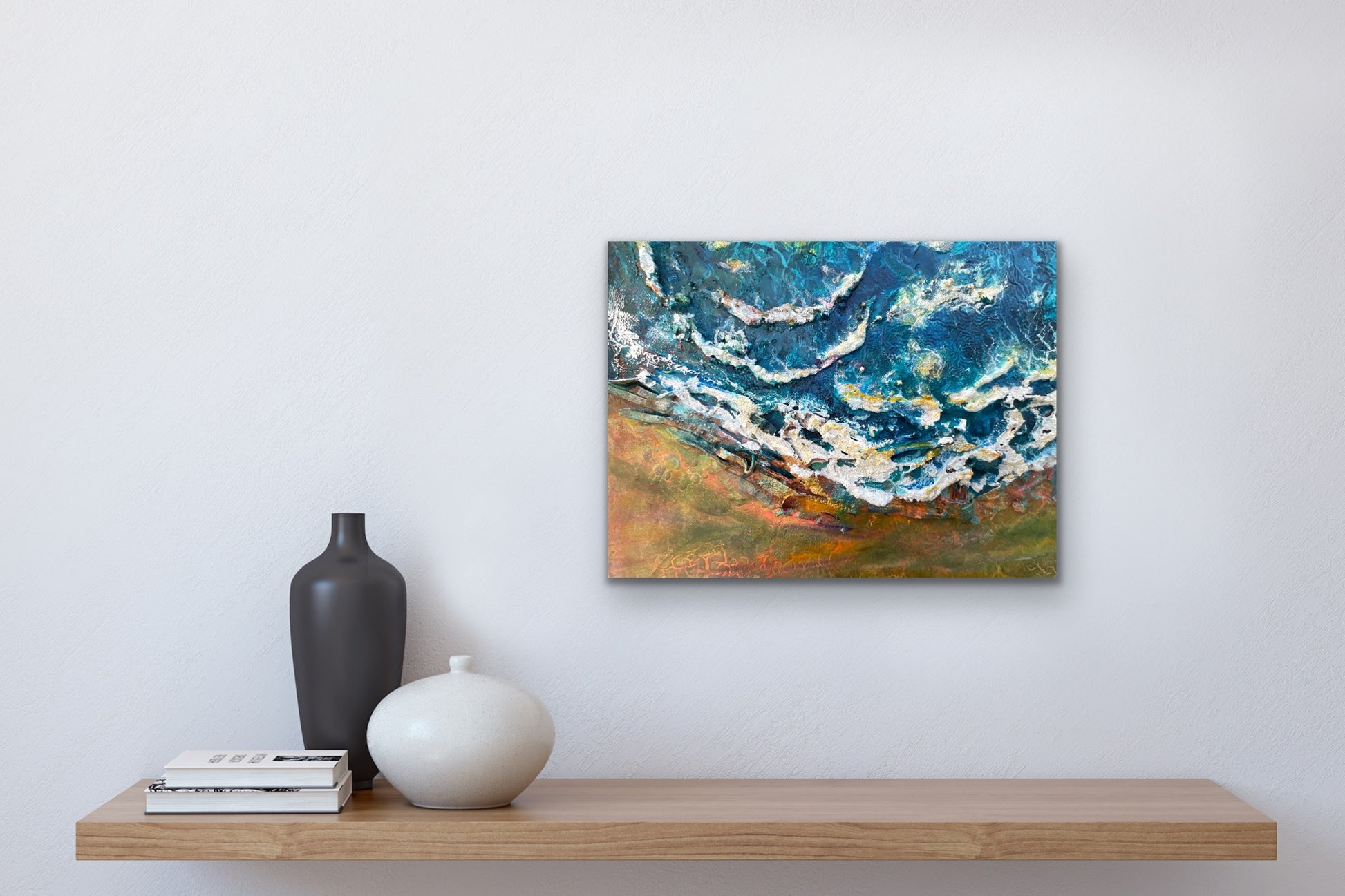 seascape with textured foamy waves crashing into the beach 